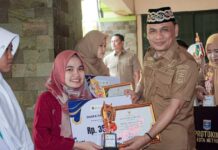 Semarak Disporapar Singing Competetion 2025: Wali Kota Metro Serahkan Hadiah dan Luncurkan Lagu Kebanggaan Daerah Wali Kota Metro serahkan hadiah lomba nyanyi kepada pemenang